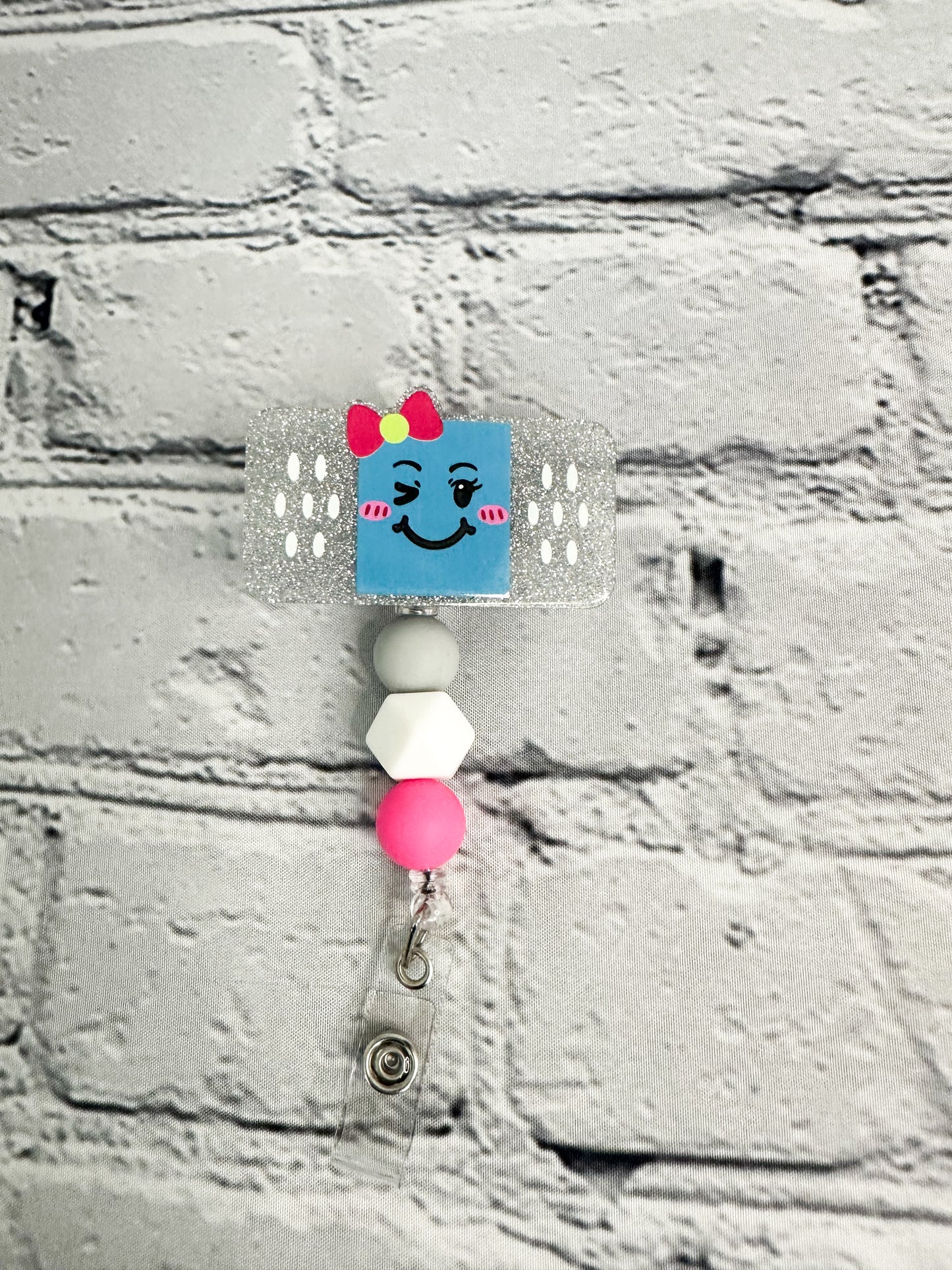 Band-Aid - Badge Reel