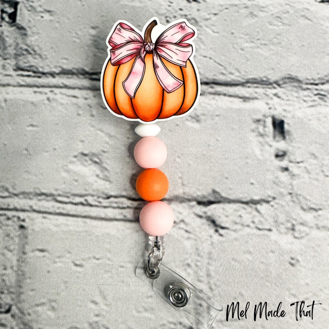 Pumpkin with Pink Bow - Badge Reel