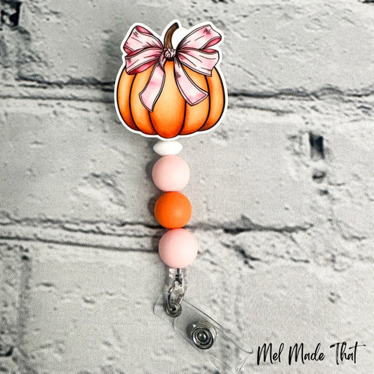 Pumpkin with Pink Bow - Badge Reel