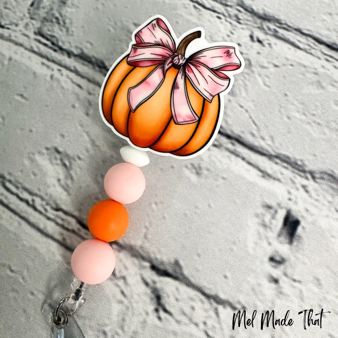 Pumpkin with Pink Bow - Badge Reel